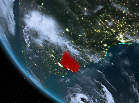 Uruguay at night highlighted in red on planet Earth with clouds. 3D illustration.の写真素材