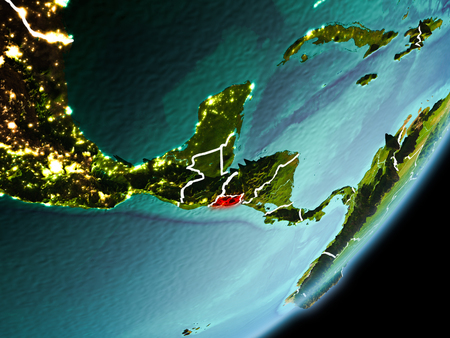 El Salvador in early morning light highlighted in red on planet Earth with visible border lines and city lights. 3D illustration.の写真素材