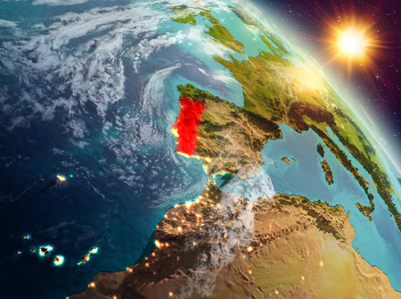 Sunrise above Portugal highlighted in red on model of planet Earth in space. 3D illustration.の写真素材