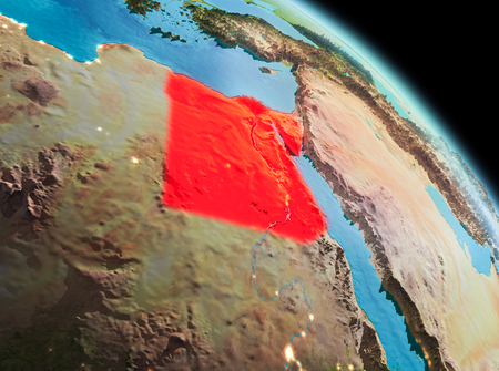 Satellite morning view of Egypt highlighted in red on planet Earth. 3D illustration.の写真素材