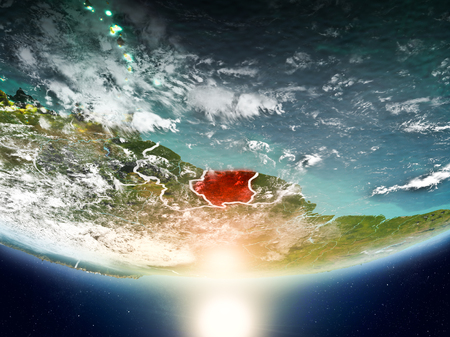Suriname from orbit of planet Earth in sunrise with highly detailed surface textures and visible country borders. 3D illustrationの写真素材