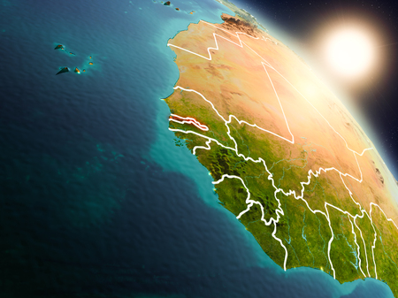 Sunset above Gambia from space on planet Earth with visible country borders. 3D illustration.の写真素材