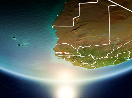 Gambia from orbit of planet Earth in sunrise with highly detailed surface textures and visible country borders. 3D illustration.の写真素材