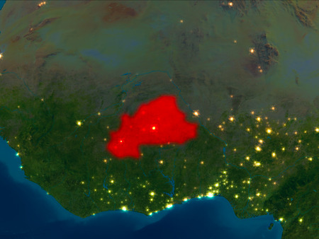 Satellite night view of Burkina Faso highlighted in red on planet Earth. 3D illustration.の写真素材