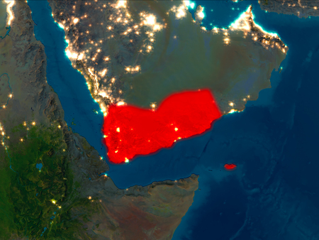 Satellite night view of Yemen highlighted in red on planet Earth. 3D illustration.の写真素材