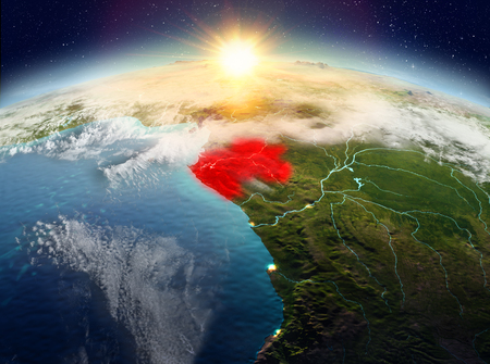 Satellite view of Gabon highlighted in red on planet Earth with clouds during sunrise. 3D illustration.の写真素材