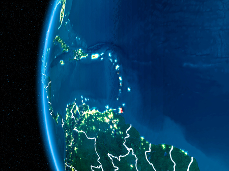 Space orbit view of Caribbean highlighted in red on planet Earth at night with visible country borders and city lights. 3D illustration.の写真素材