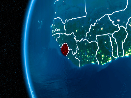 Space orbit view of Sierra Leone highlighted in red on planet Earth at night with visible country borders and city lights. 3D illustration.の写真素材