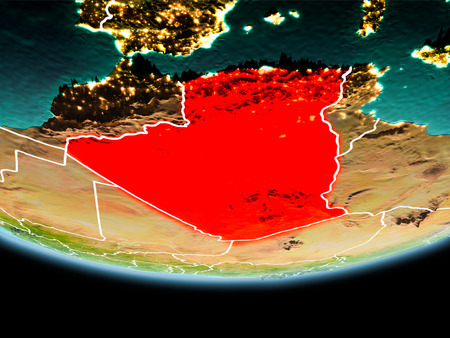 Country of Algeria in red on planet Earth in the evening with visible border lines and city lights. 3D illustration.の写真素材