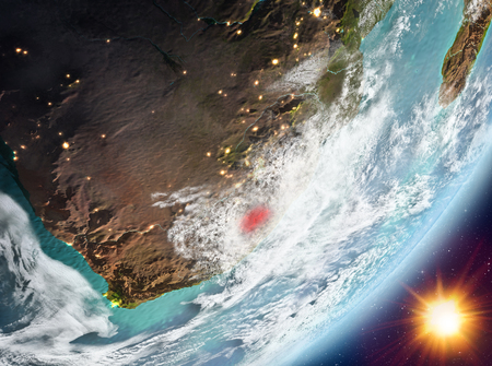 Lesotho from orbit of planet Earth in sunrise with highly detailed surface textures and clouds. 3D illustration.の写真素材