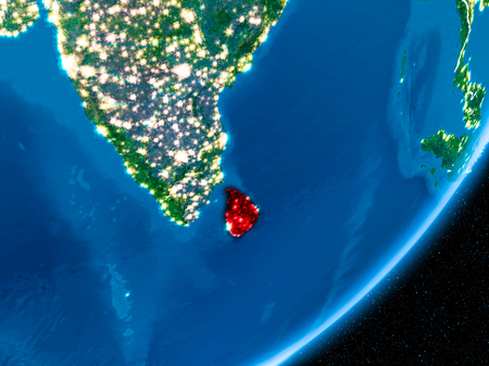 Sri Lanka in red on planet Earth at night with visible borderlines and city lights. 3D illustration.の写真素材
