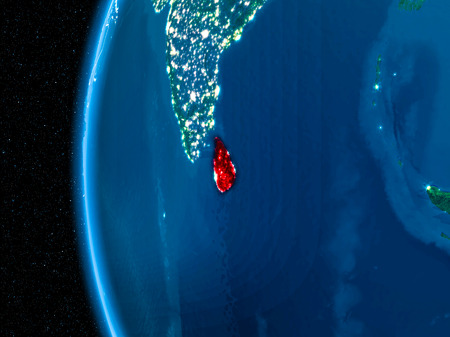 Space orbit view of Sri Lanka highlighted in red on planet Earth at night with visible country borders and city lights. 3D illustration.の写真素材