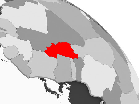 3D render of Burkina Faso in red on grey political globe with transparent oceans. 3D illustration.の写真素材