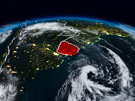 Uruguay from space at night on Earth with visible country borders. 3D illustration.の写真素材