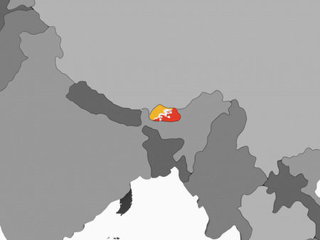 Bhutan on gray political globe with embedded flag. 3D illustration.の写真素材