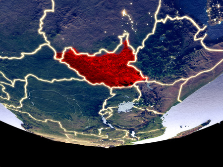 Satellite view of South Sudan from space at night. Beautifully detailed plastic planet surface with visible city lights. 3D illustration.の写真素材