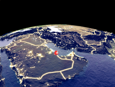 Qatar from space on planet Earth at night with bright city lights. Detailed plastic planet surface with real mountains. 3D illustration.の写真素材