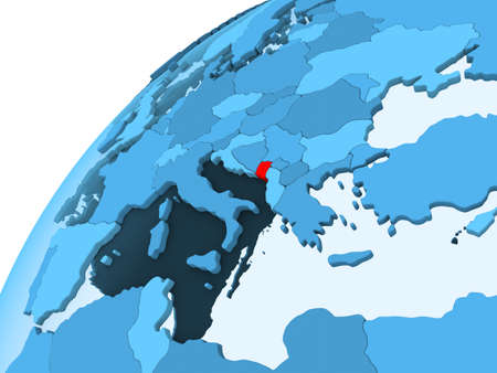 Montenegro in red on blue model of political globe with transparent oceans. 3D illustration.の写真素材