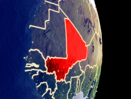 Satellite view of Mali at night with visible bright city lights. Extremely fine detail of the plastic planet surface. 3D illustration.の写真素材