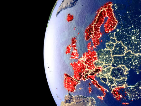 Night view of Western Europe from space with visible city lights. Very detailed plastic planet surface. 3D illustration.の写真素材