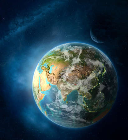 Bhutan from space on Earth surrounded by space with Moon and Milky Way. Detailed planet surface with...