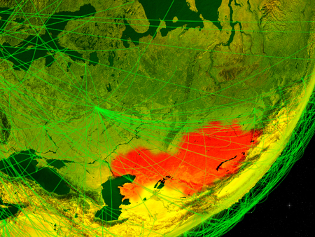 Kazakhstan on green model of planet Earth with network at night. Concept of digital technology, communication and travel. 3D illustration.の写真素材