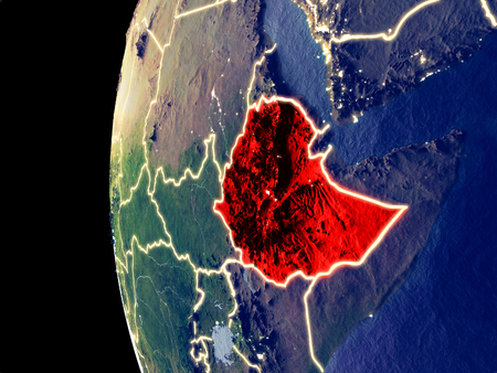 Night view of Ethiopia from space with visible city lights. Very detailed plastic planet surface. 3D illustration.の写真素材