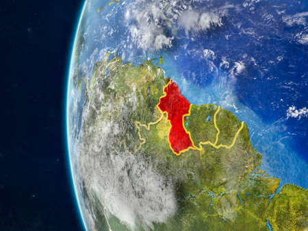 Guyana from space on model of planet Earth with country borders and very detailed planet surface and clouds. 3D illustration.の写真素材
