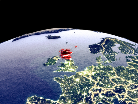 Scotland from space on planet Earth at night with bright city lights. Detailed plastic planet surface with real mountains. 3D illustration.の写真素材