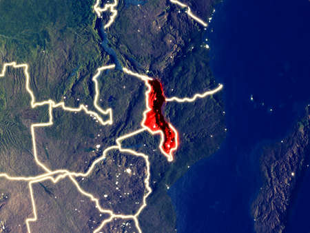 Malawi from space on Earth at night. Very fine detail of the plastic planet surface with bright city lights. 3D illustration.の写真素材