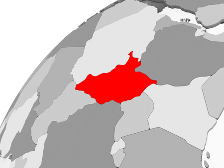 Map of South Sudan in red on grey political globe with transparent oceans. 3D illustration.の写真素材