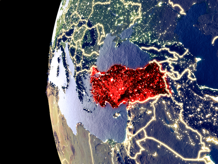 Night view of Turkey from space with visible city lights. Very detailed plastic planet surface. 3D illustration.の写真素材