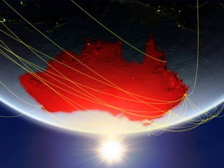 Australia on model of planet Earth in sunrise with network representing travel and communication. 3D illustration.の写真素材