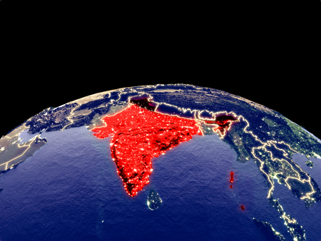 India from space on planet Earth at night with bright city lights. Detailed plastic planet surface with real mountains. 3D illustration.の写真素材