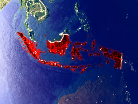 Indonesia from space on Earth at night. Very fine detail of the plastic planet surface with bright city lights. 3D illustration.の写真素材