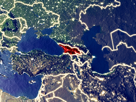 Georgia from space on Earth at night. Very fine detail of the plastic planet surface with bright city lights. 3D illustration.の写真素材