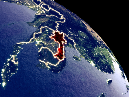 Laos at night from orbit. Plastic planet surface with visible city lights. 3D illustration.の写真素材
