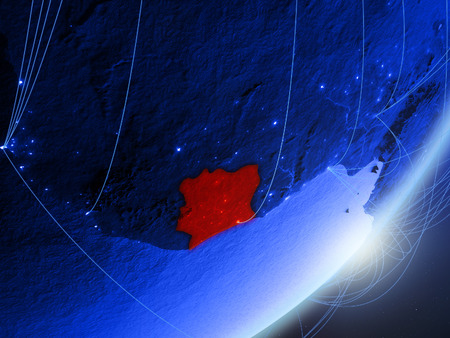 Ivory Coast on green model of planet Earth with network at night. Concept of blue digital technology, communication and travel. 3D illustration.の写真素材