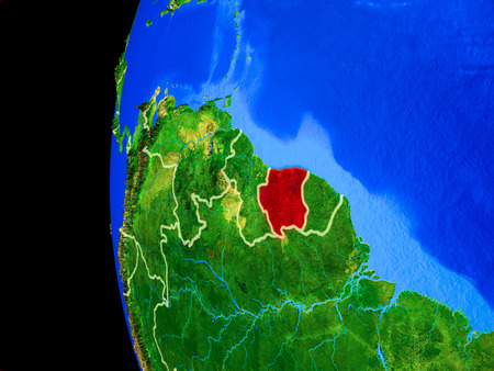 Suriname from space on realistic model of planet Earth with country borders and detailed planet surface. 3D illustration.の写真素材