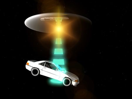 A car that is being adducted by a UFO with a glowing beam.の写真素材