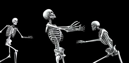 An x ray image of a group of skeletons. A suitable medical or  based image.