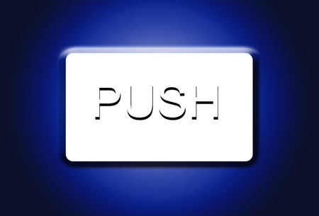 An image of a button or key on a keyboard, with the action word push on it.の写真素材