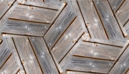 A seamless tile pattern texture background, made from a wooden fence.の写真素材