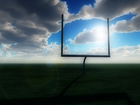 An American football post on a field.の写真素材