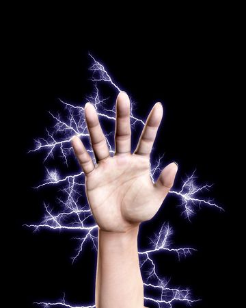 A hand that is shooting out electricity.の写真素材