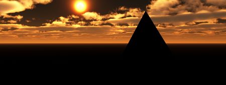 An ancient pyramid in a desert landscape.  の写真素材