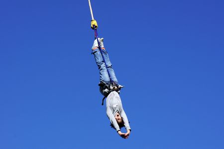 LONDON - SEPTEMBER 25: Bungee Jumper At The Rat Race Urban Adventure Event September 25th, 2010 By City Hall London, Englandのeditorial素材