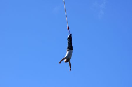 LONDON - SEPTEMBER 25: Bungee Jumper At The Rat Race Urban Adventure Event September 25th, 2010 By City Hall London, Englandのeditorial素材