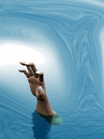 Drowning persons hand reaching out in a tidal waveの写真素材