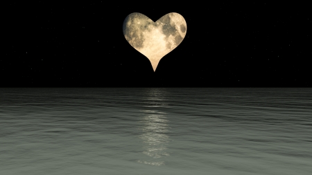 A Heart shaped moon over the sea.の写真素材